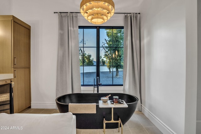 dining space featuring light tile patterned floors