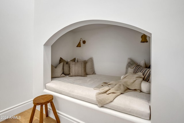 bedroom featuring light wood-type flooring and baseboards