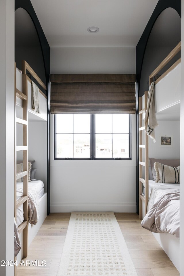 bedroom featuring light wood-type flooring