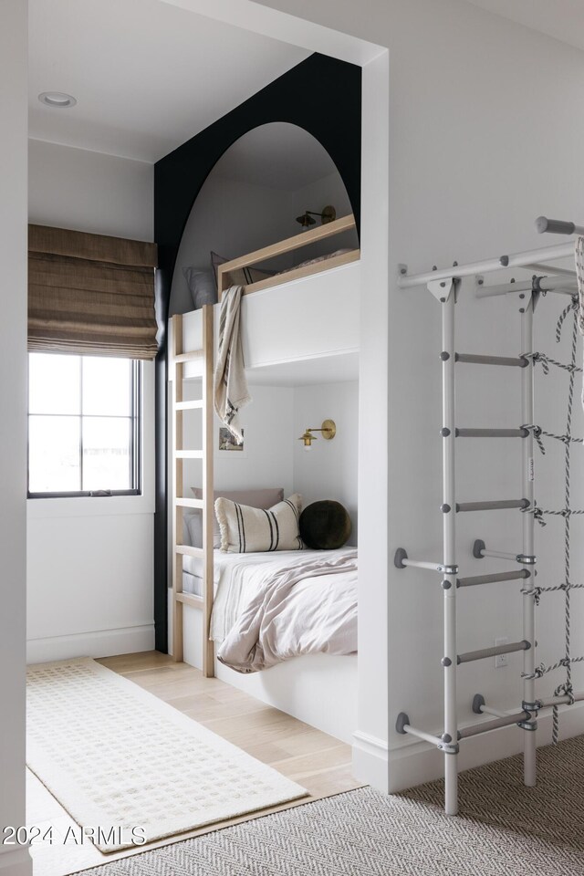 bedroom featuring hardwood / wood-style floors