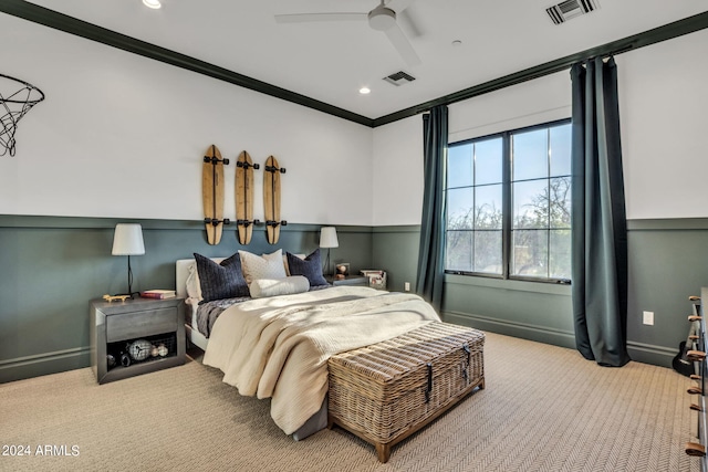 bedroom with carpet, ornamental molding, and ceiling fan