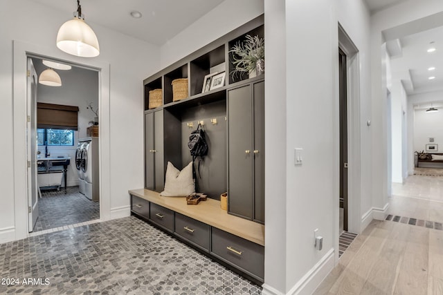 mudroom with light tile patterned flooring