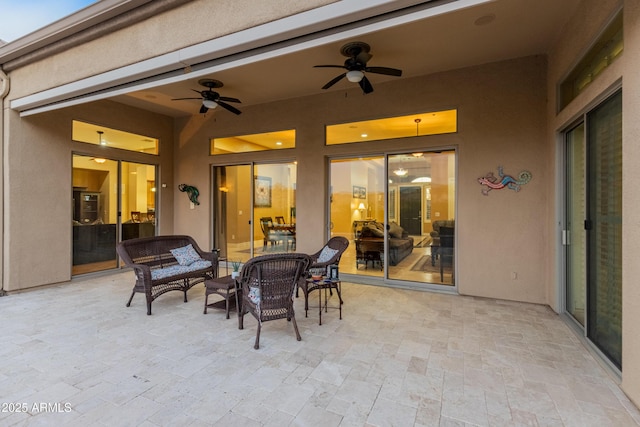 view of patio featuring ceiling fan