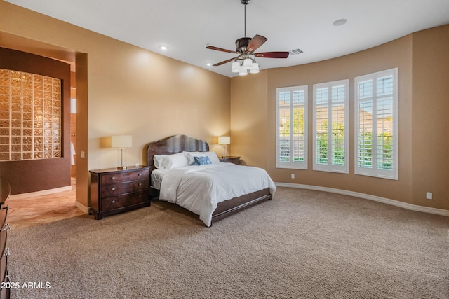 carpeted bedroom with ceiling fan