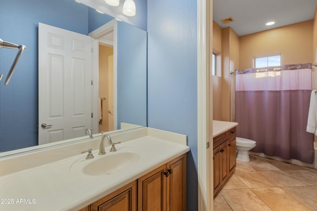 full bathroom with toilet, tile patterned flooring, shower / bathtub combination with curtain, and vanity