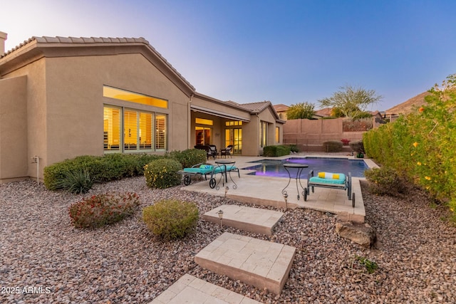 view of pool featuring a patio and a jacuzzi