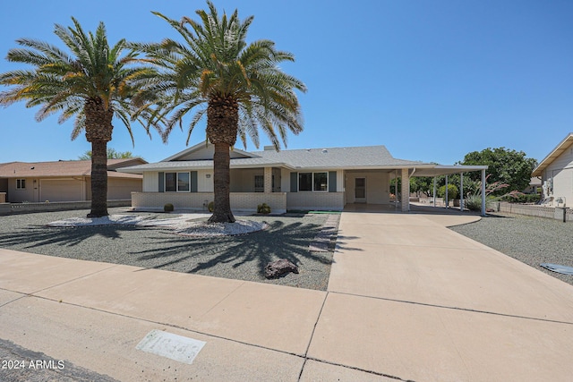 view of front of house featuring a carport