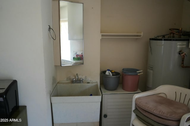 bathroom featuring water heater and sink