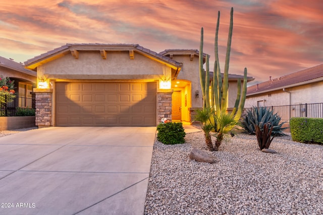 view of front of property with a garage