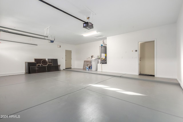 garage featuring a garage door opener and gas water heater