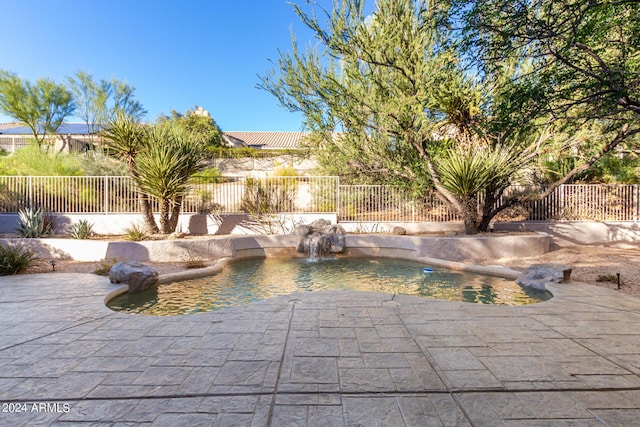 view of pool with a fenced backyard, a patio area, and a fenced in pool