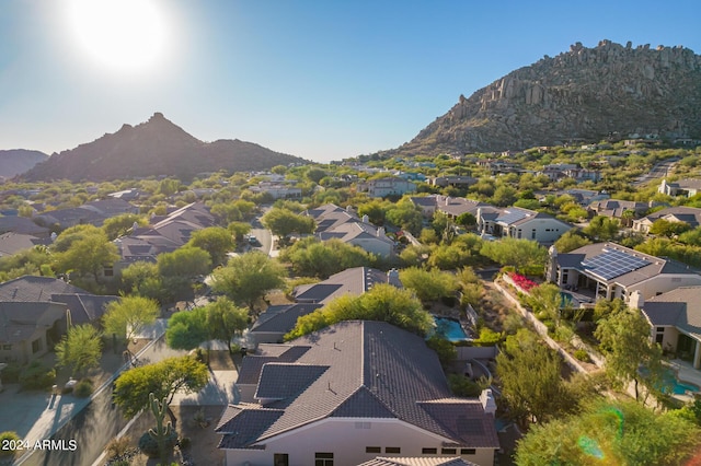 birds eye view of property featuring a mountain view and a residential view