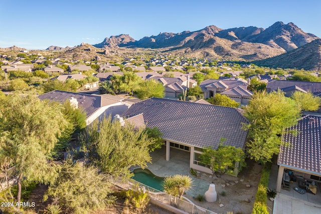 drone / aerial view with a mountain view and a residential view