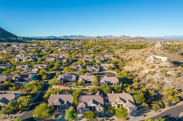 aerial view featuring a mountain view and a residential view