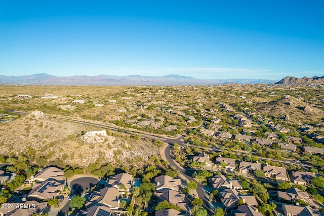 drone / aerial view featuring a mountain view and a residential view