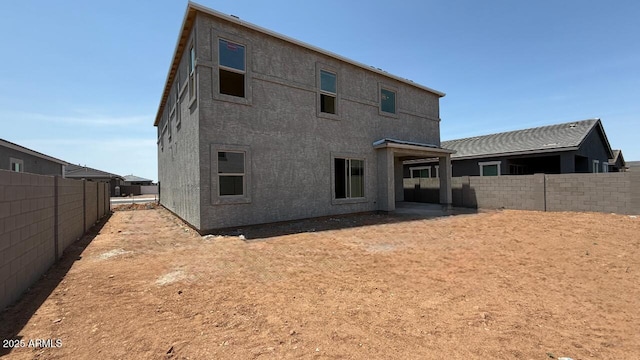 11444 E Utopia Ave, Mesa, AZ 85212 - rear view of property featuring a fenced backyard and stucco siding