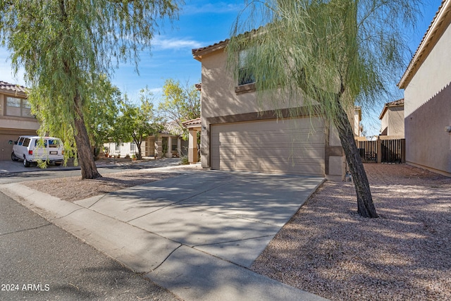 view of front of home featuring a garage