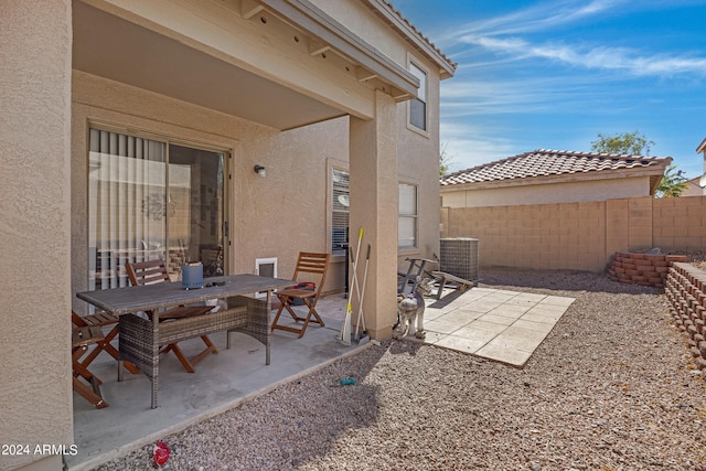 view of patio / terrace with central air condition unit