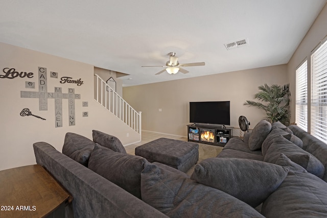 living room featuring ceiling fan