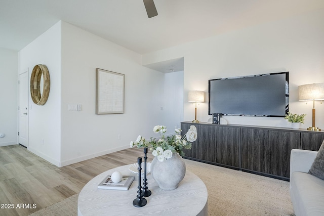 644 N Vine St, Chandler, AZ 85225 - living area featuring light wood-style flooring, ceiling fan, and baseboards