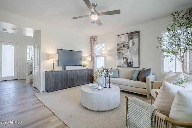 644 N Vine St, Chandler, AZ 85225 - living area featuring light wood-type flooring and ceiling fan