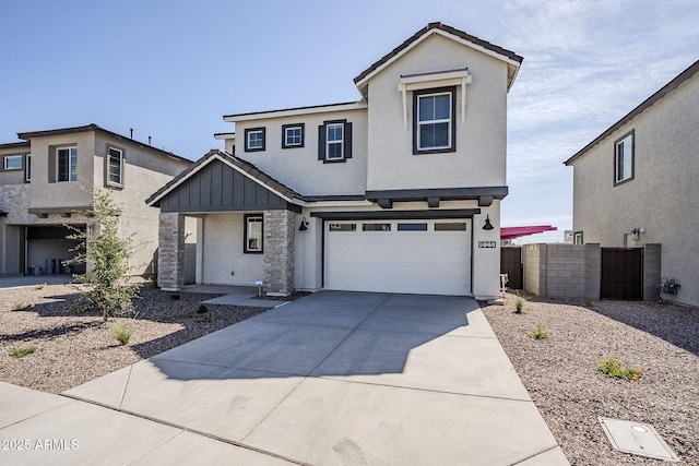644 N Vine St, Chandler, AZ 85225 - view of front of house with a garage, concrete driveway, board and batten siding, and stucco siding