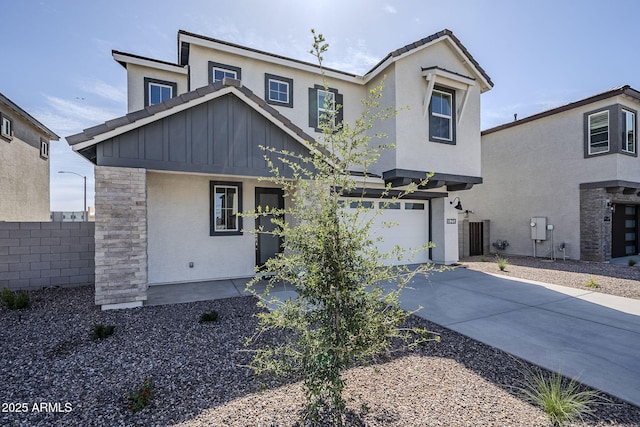 644 N Vine St, Chandler, AZ 85225 - view of front of property with board and batten siding, driveway, a garage, and stucco siding