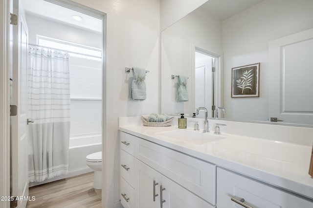 644 N Vine St, Chandler, AZ 85225 - full bathroom with toilet, vanity, shower / tub combo, and wood finished floors