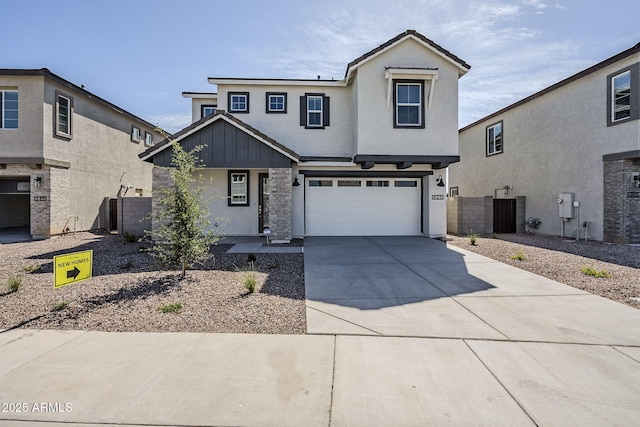 644 N Vine St, Chandler, AZ 85225 - view of front of home with driveway, a garage, board and batten siding, and stucco siding