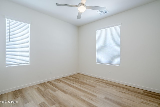 644 N Vine St, Chandler, AZ 85225 - empty room with light wood-style floors, baseboards, and a ceiling fan
