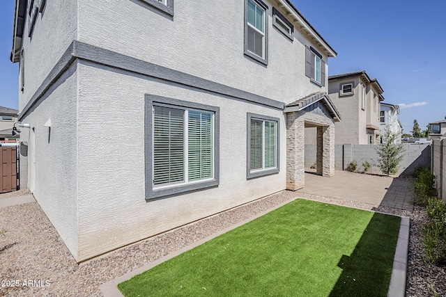 644 N Vine St, Chandler, AZ 85225 - back of property with a patio and stucco siding