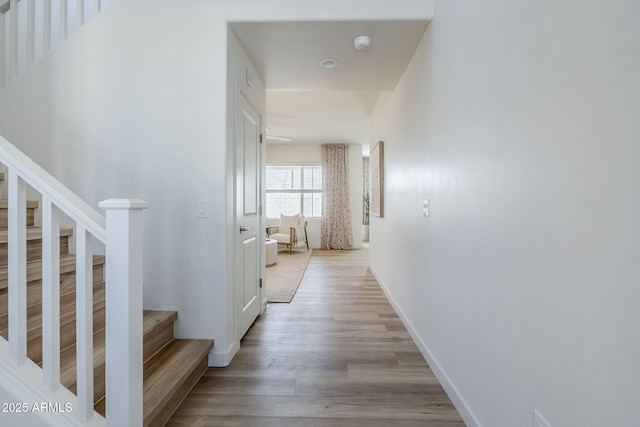 644 N Vine St, Chandler, AZ 85225 - hallway with stairway, light wood-style floors, and baseboards