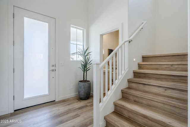 644 N Vine St, Chandler, AZ 85225 - entrance foyer featuring stairs, wood finished floors, and baseboards