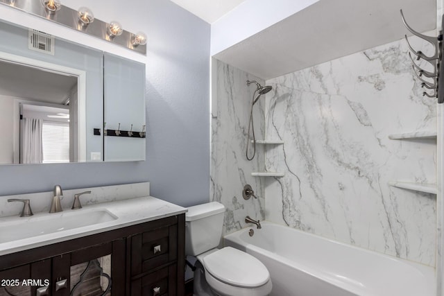 bathroom featuring vanity, toilet, visible vents, and shower / bath combination