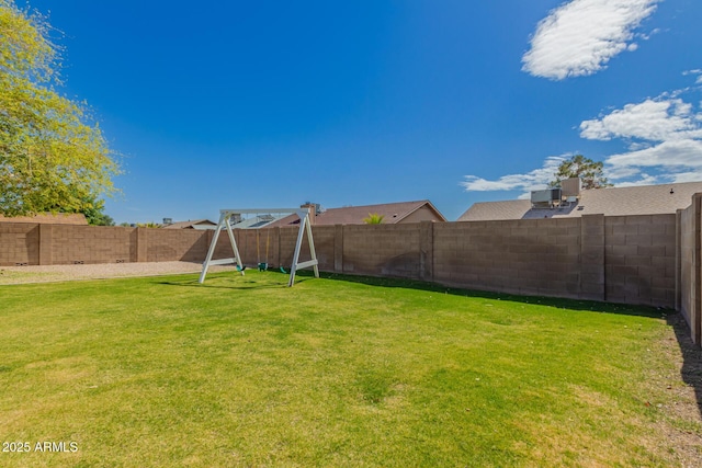 view of yard featuring a fenced backyard