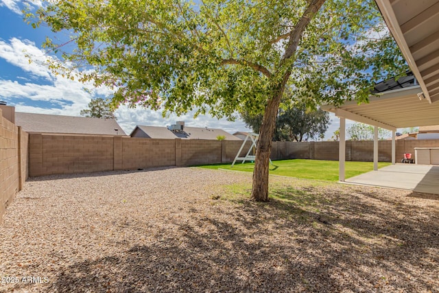 view of yard with a fenced backyard and a patio area