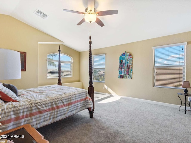 carpeted bedroom featuring ceiling fan and vaulted ceiling