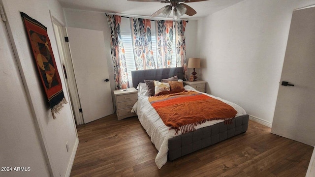 110 N Pinal Ave, Superior, AZ 85173 - bedroom with ceiling fan and dark wood-type flooring