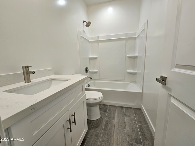 full bathroom with shower / bathing tub combination, toilet, hardwood / wood-style flooring, and vanity