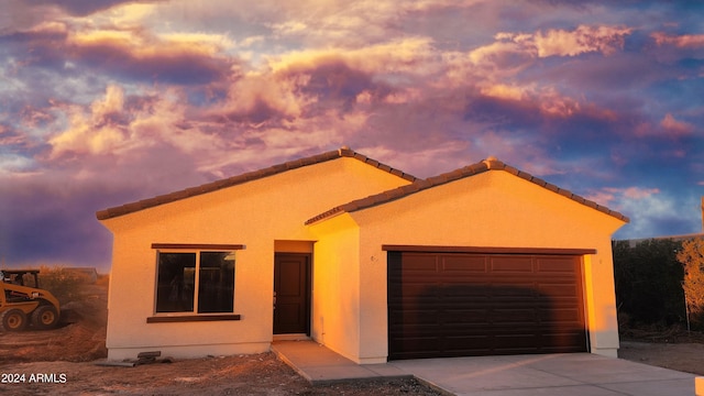 view of front of home featuring a garage