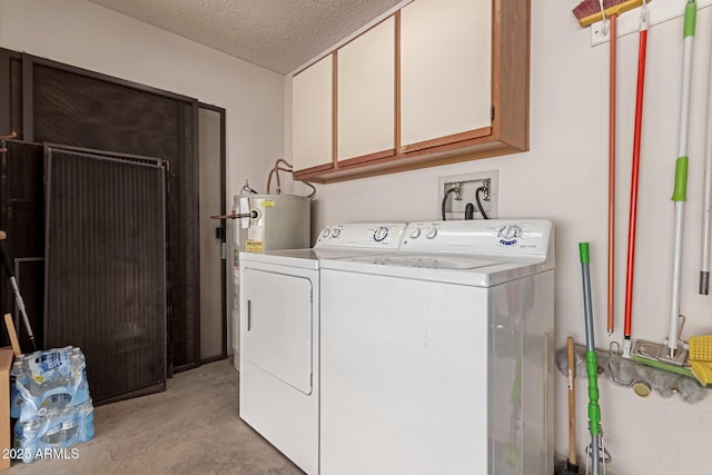 laundry area featuring cabinets, separate washer and dryer, a textured ceiling, and water heater