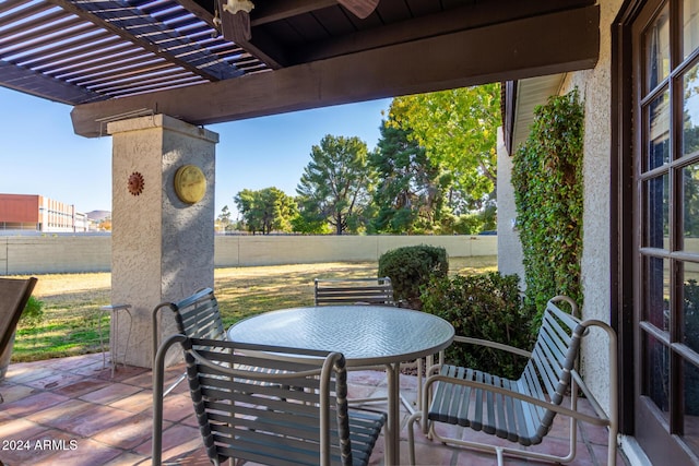 view of patio / terrace featuring a pergola and ceiling fan