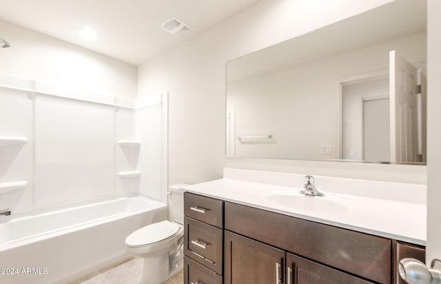 full bathroom featuring tile patterned flooring, vanity, shower / bath combination, and toilet