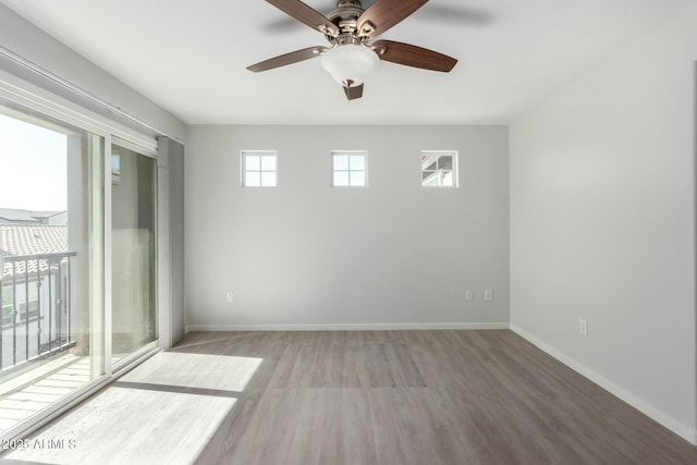 spare room with hardwood / wood-style flooring