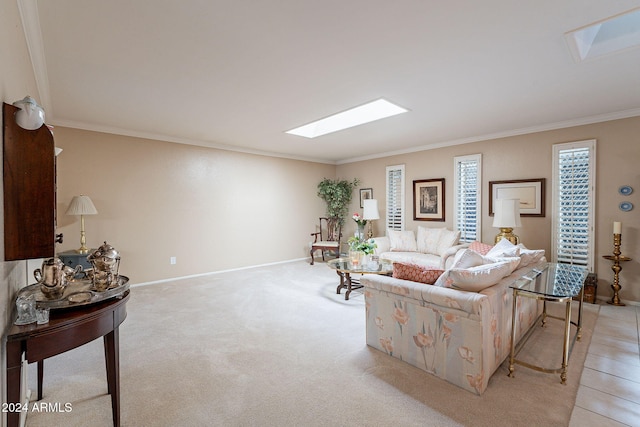 carpeted living room with crown molding and a skylight