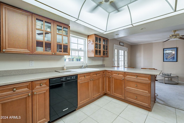 kitchen featuring dishwasher, kitchen peninsula, a wealth of natural light, and sink