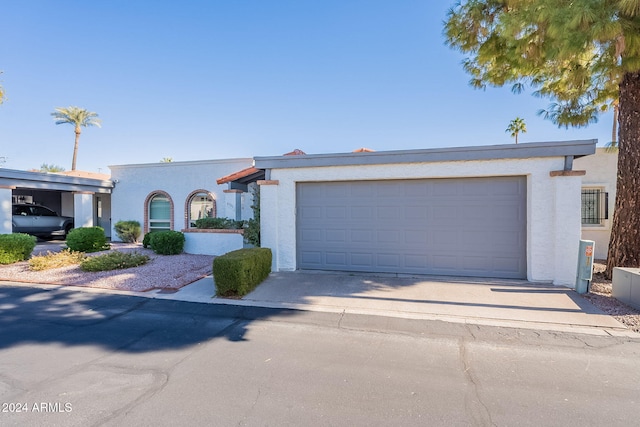 view of front of property featuring a garage