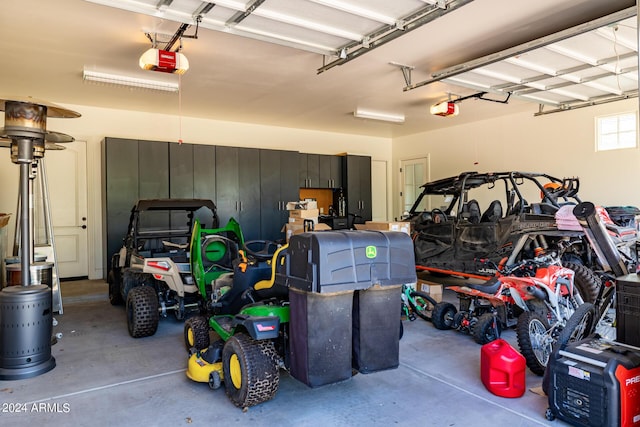 garage featuring a garage door opener