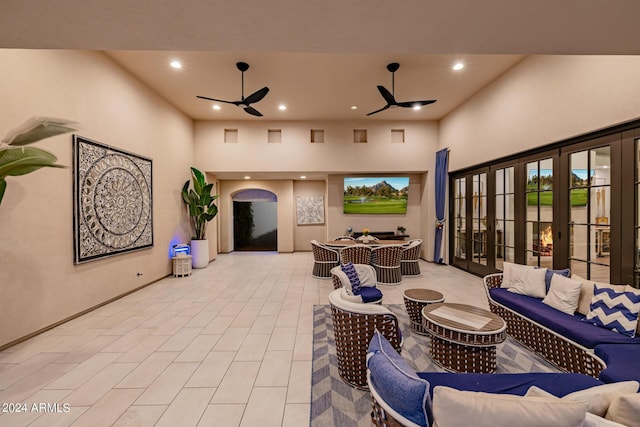 view of patio / terrace featuring an outdoor living space and a ceiling fan