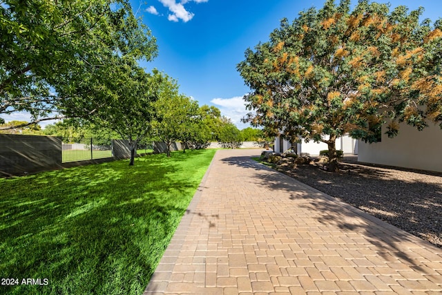 exterior space featuring fence and a yard